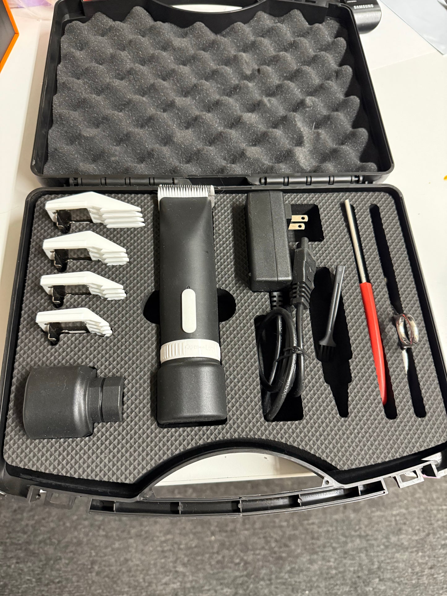 Cordless A5 Clipper Includes Two Batteries, Combs, Charger Demo Model